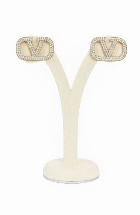 حلق فلنتينو ذهبي بزركون